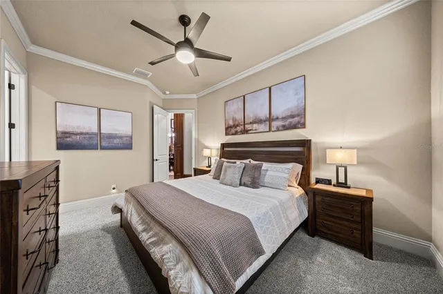 a view of a workspace with furniture and wooden floor