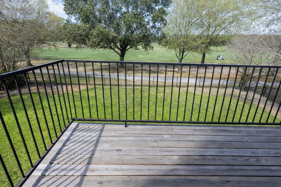 5718 Oakmoss Trail Spring, TX 77379 - Photo 32 of 50 Savor your morning coffee on the second-floor balcony with stunning golf course views.