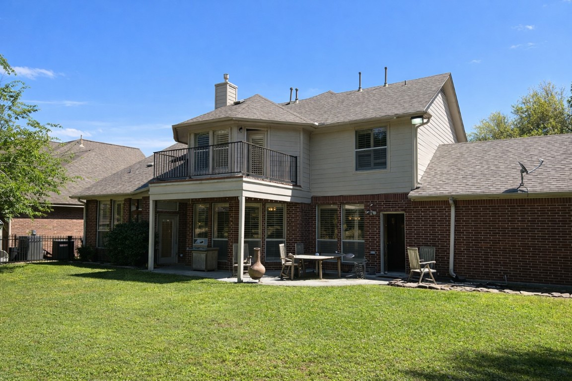 5718 Oakmoss Trail Spring, TX 77379 - Photo 50 of 50 Backyard with cowboy pool and protective nets removed. (photo digitally enhanced)