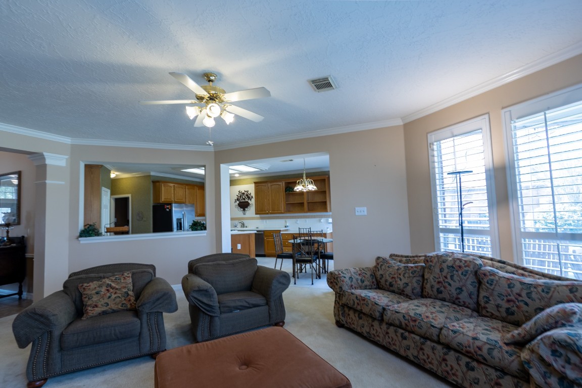5718 Oakmoss Trail Spring, TX 77379 - Photo 10 of 50 Spacious and inviting living area with abundant natural light, perfect for relaxation and entertaining.