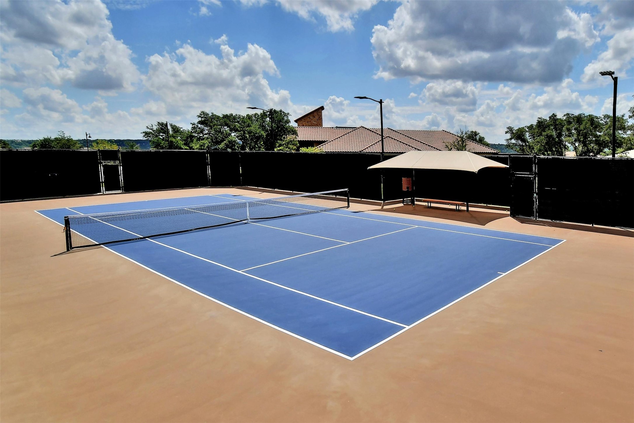 1820 Ficuzza Way Leander, TX 78641 - Photo 32 of 35 Experience the thrill of pickleball
with friends and neighbors on the
well-appointed court.