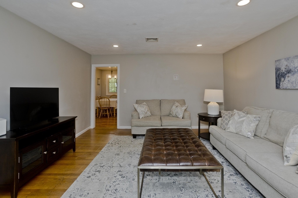 213 Spring Grove Avenue Northampton, MA 01062 - Photo 16 of 41 a living room with furniture and a flat screen tv