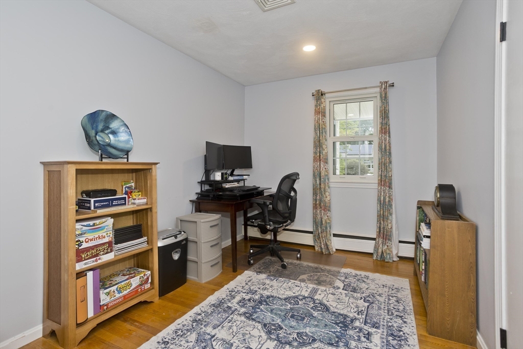 213 Spring Grove Avenue Northampton, MA 01062 - Photo 28 of 41 a view of a workspace with furniture and a window