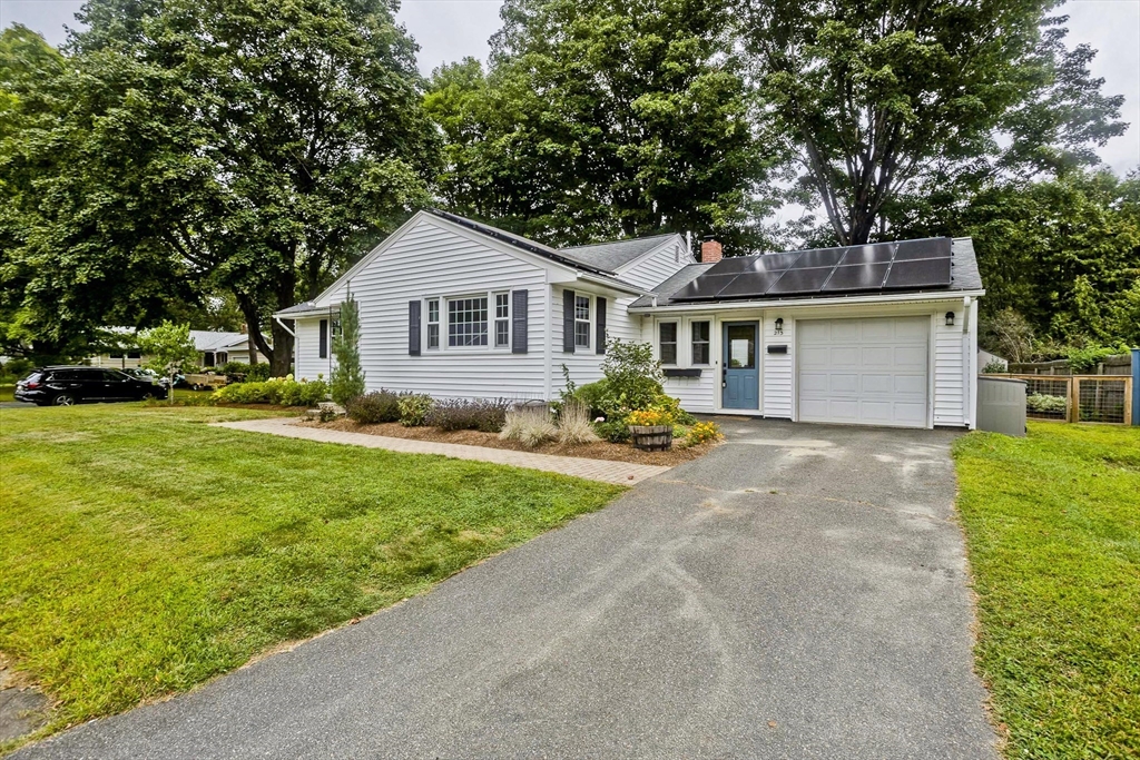 213 Spring Grove Avenue Northampton, MA 01062 - Photo 3 of 41 a front view of house with yard and green space