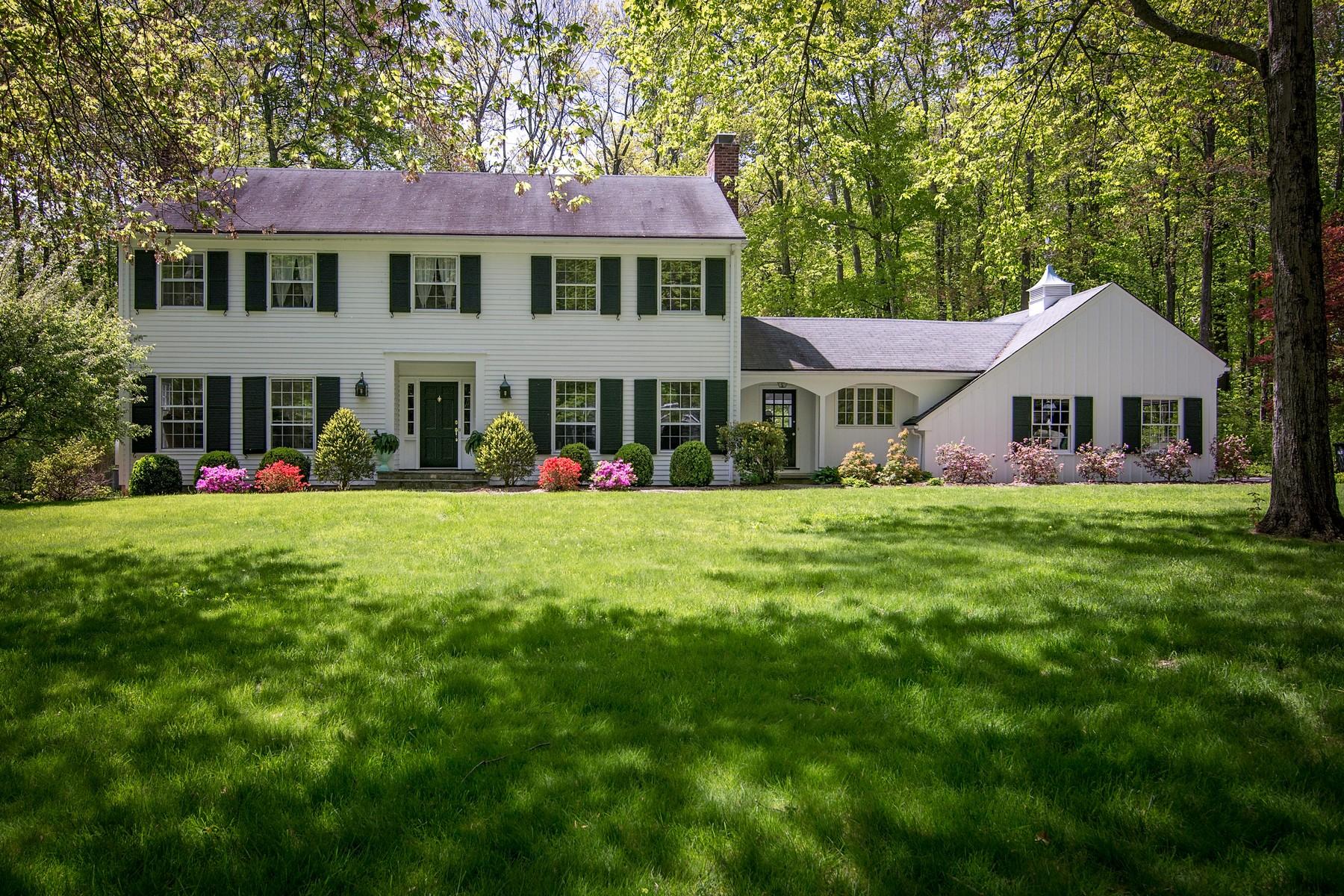 10 Pilgrim Road Darien, CT 06820 - Photo 2 of 31 a front view of a house with garden