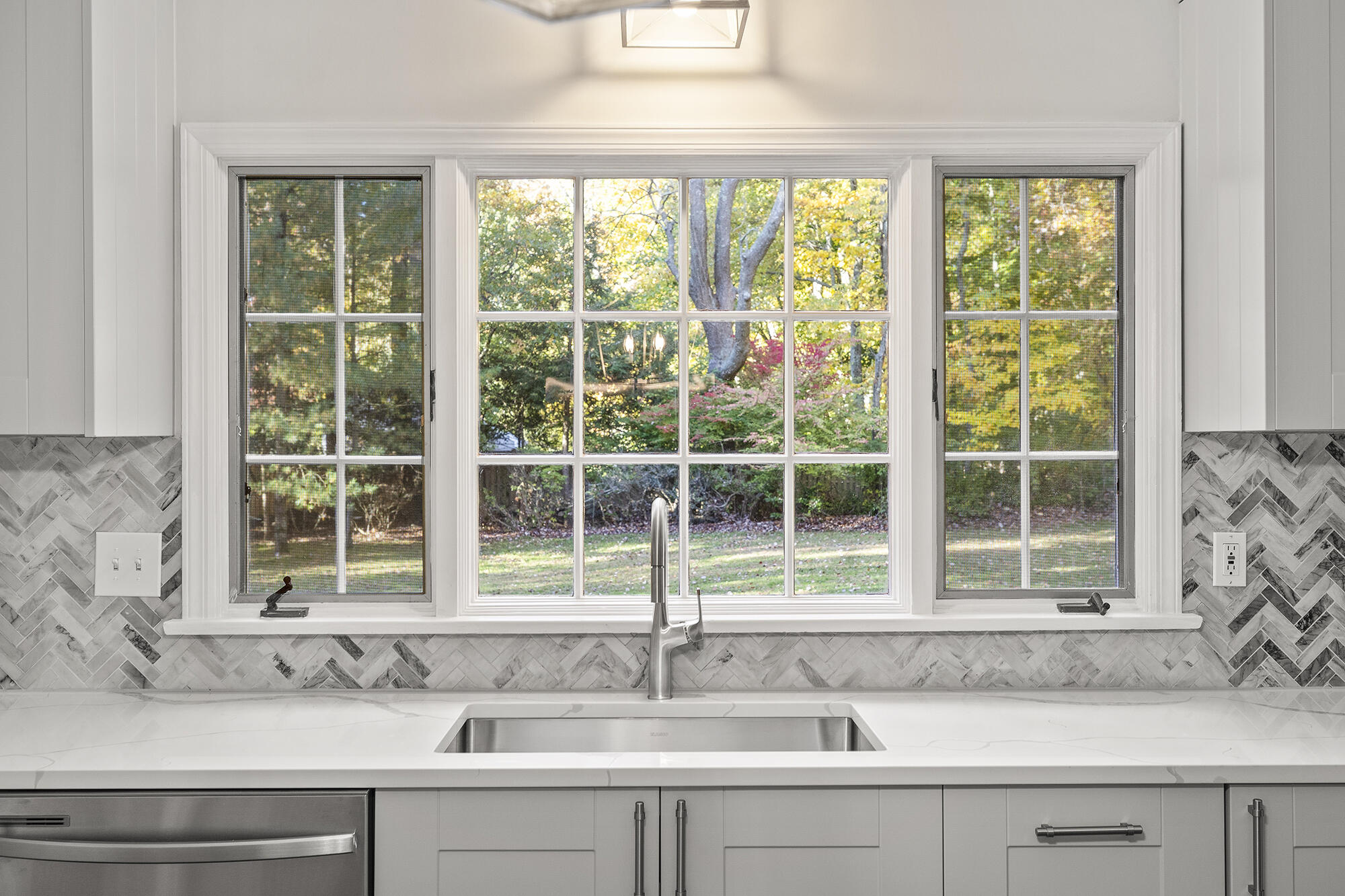 10 Pilgrim Road Darien, CT 06820 - Photo 12 of 31 a sink sitting next to a window