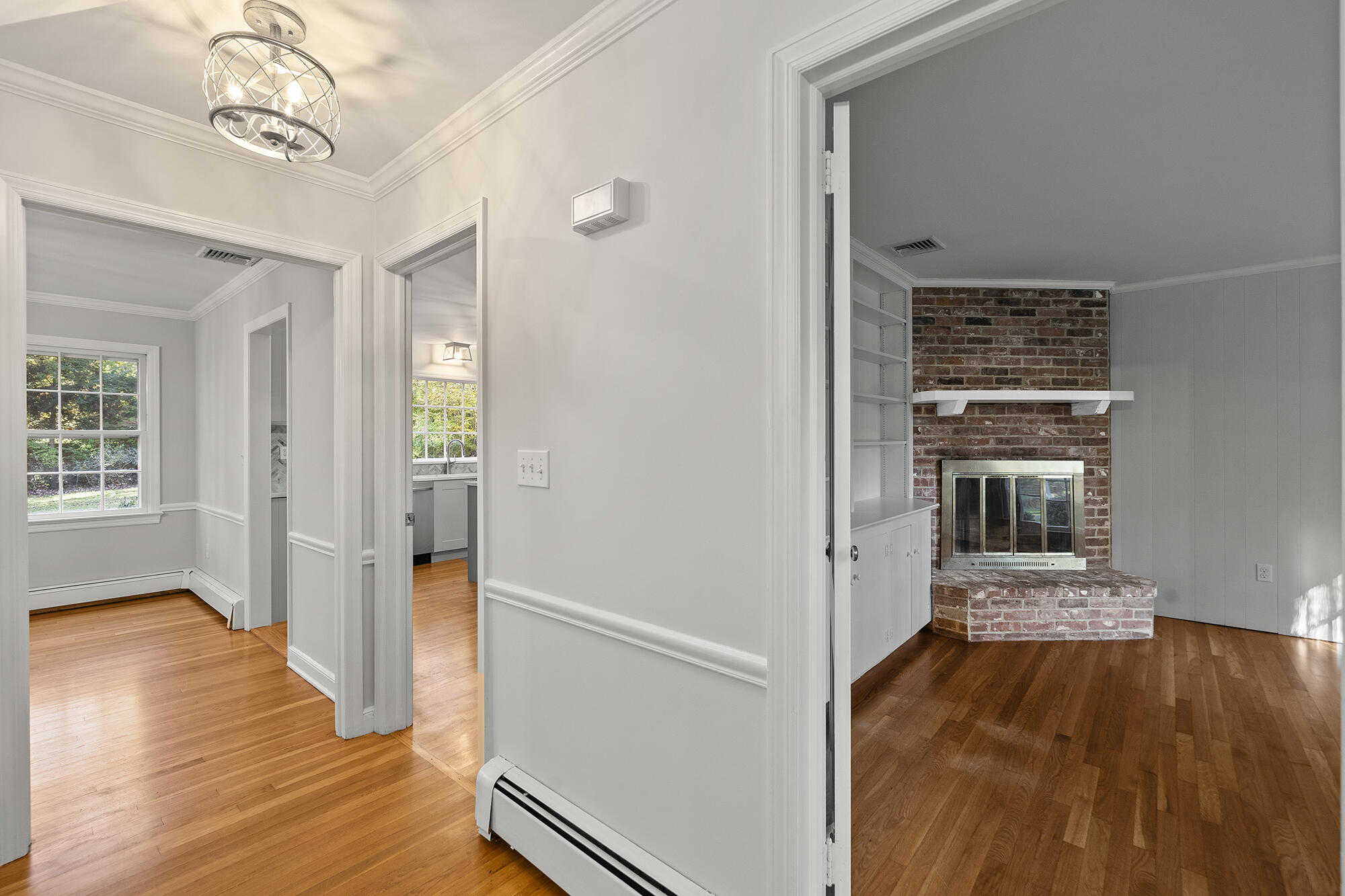 10 Pilgrim Road Darien, CT 06820 - Photo 17 of 31 wooden floor in an empty room with a window