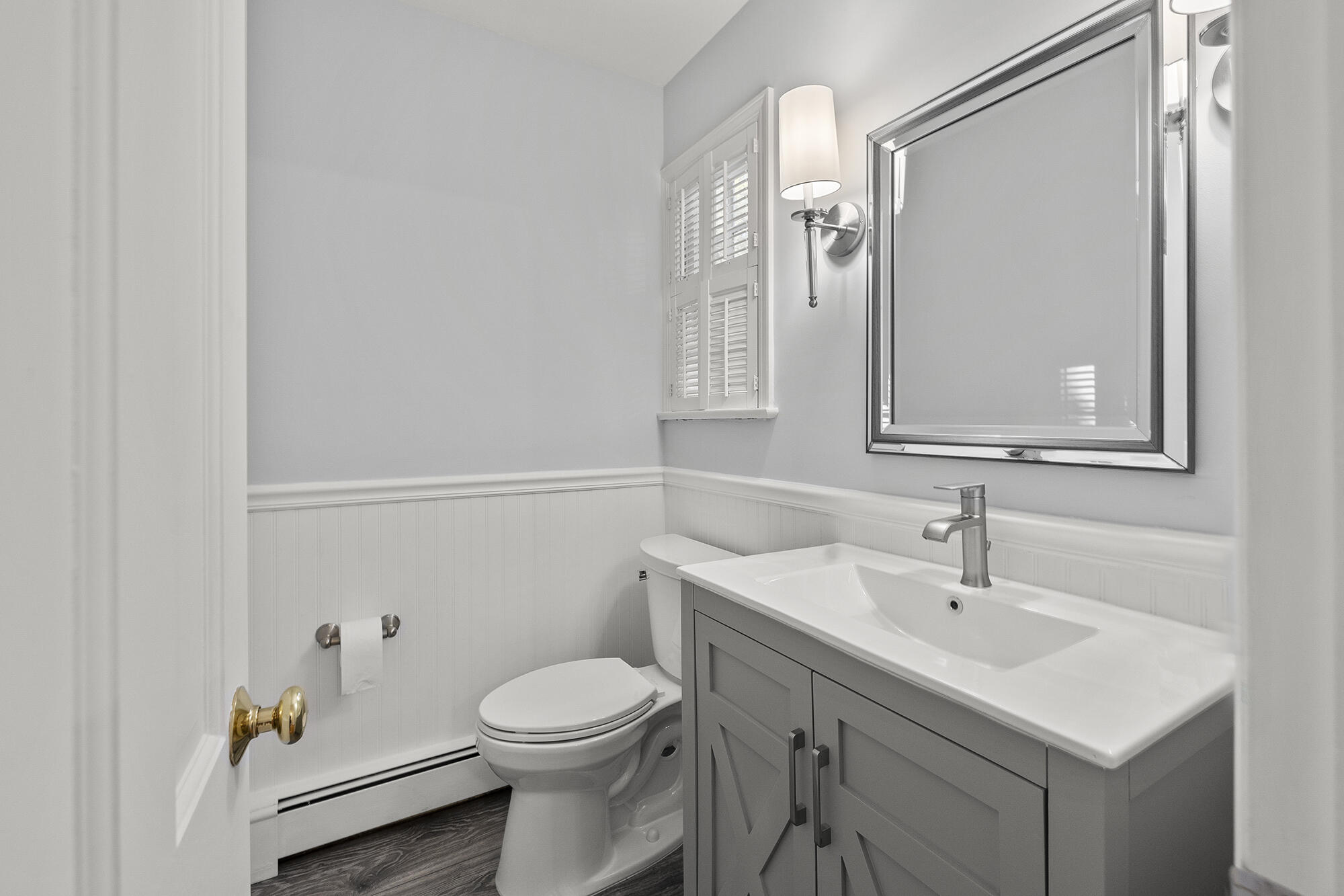 10 Pilgrim Road Darien, CT 06820 - Photo 19 of 31 a bathroom with a sink a toilet and shower
