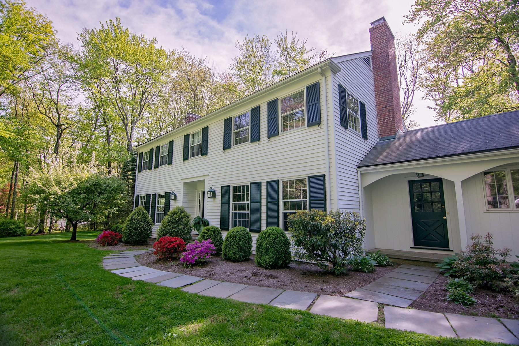 10 Pilgrim Road Darien, CT 06820 - Photo 3 of 31 a view of a house with a yard and sitting area