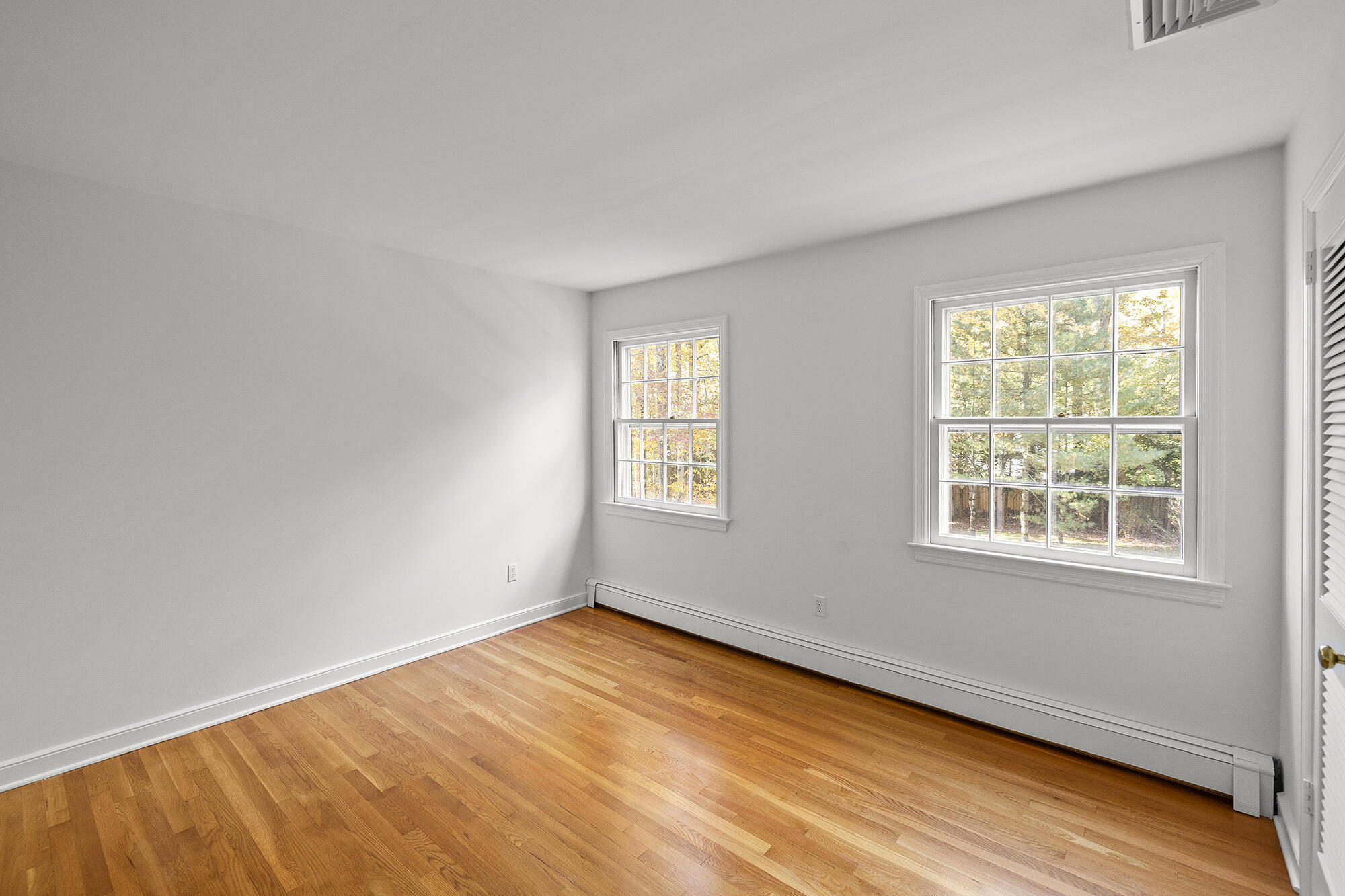 10 Pilgrim Road Darien, CT 06820 - Photo 21 of 31 an empty room with a window