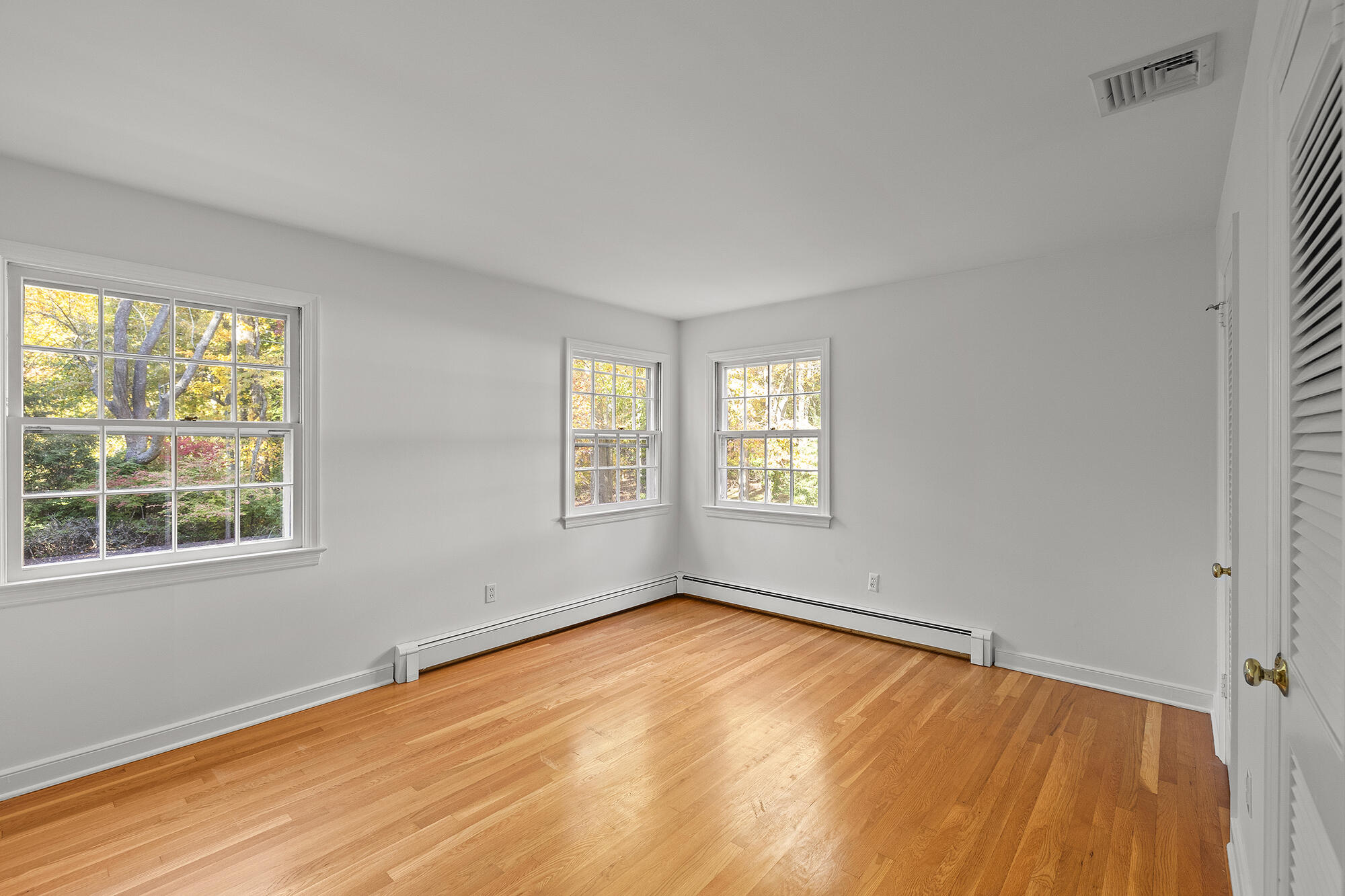 10 Pilgrim Road Darien, CT 06820 - Photo 22 of 31 a view of an empty room with a window