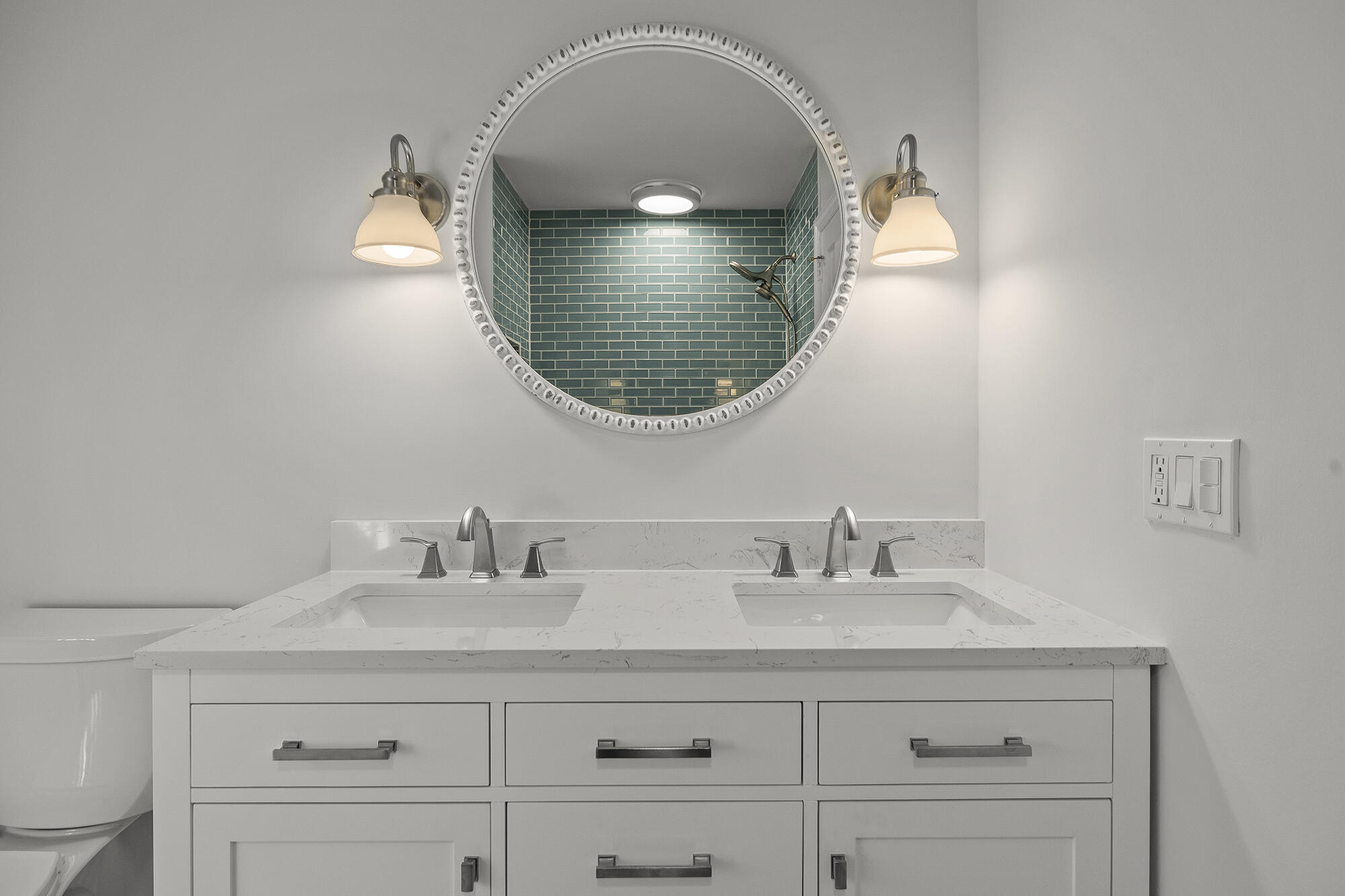 10 Pilgrim Road Darien, CT 06820 - Photo 24 of 31 a bathroom with a sink and a mirror