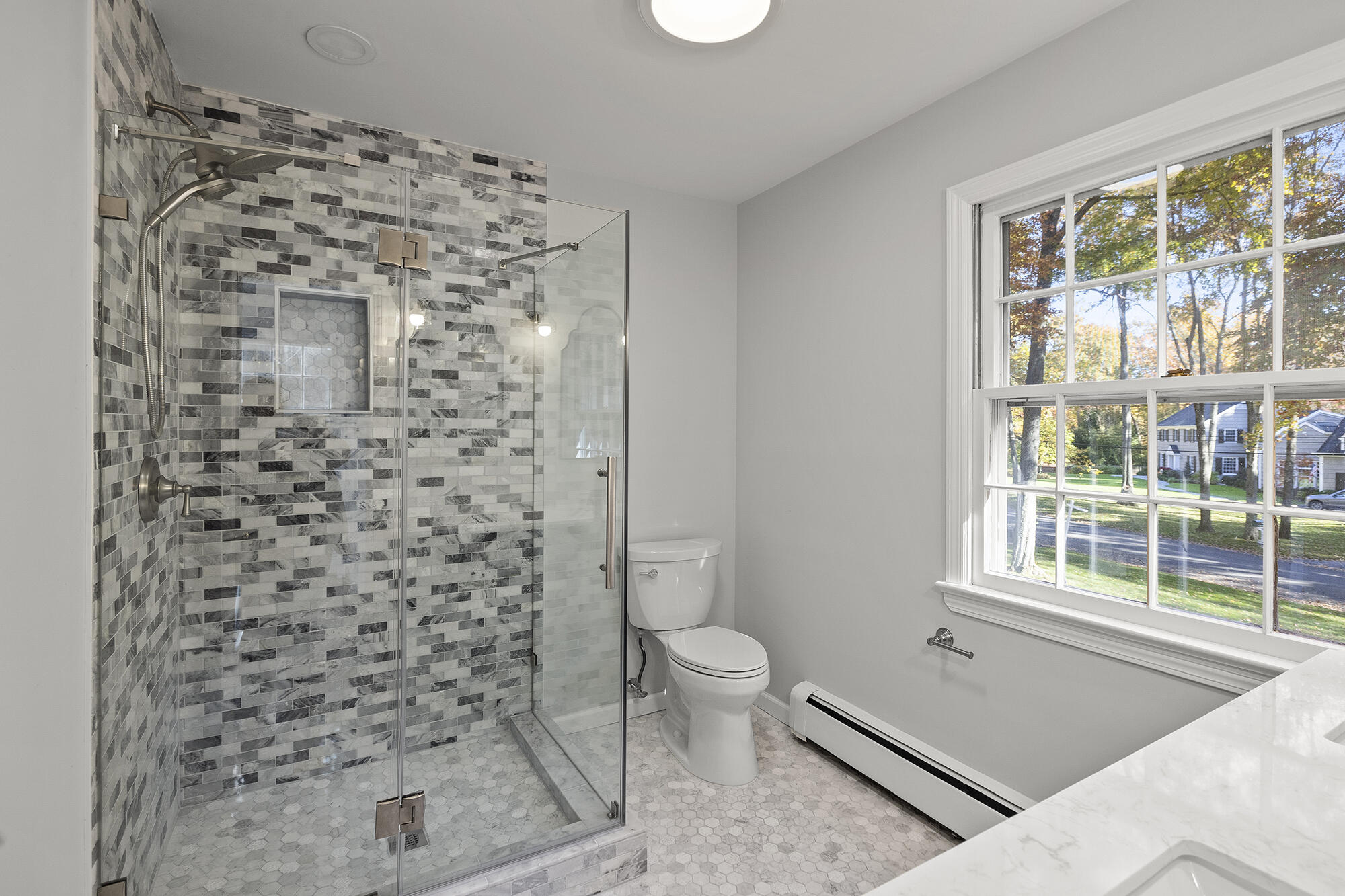 10 Pilgrim Road Darien, CT 06820 - Photo 26 of 31 a bathroom with a toilet and a shower
