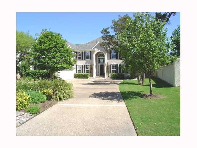 3209 Rustic River Cove Austin, TX 78746 - Photo 1 of 1 a front view of a house with a yard