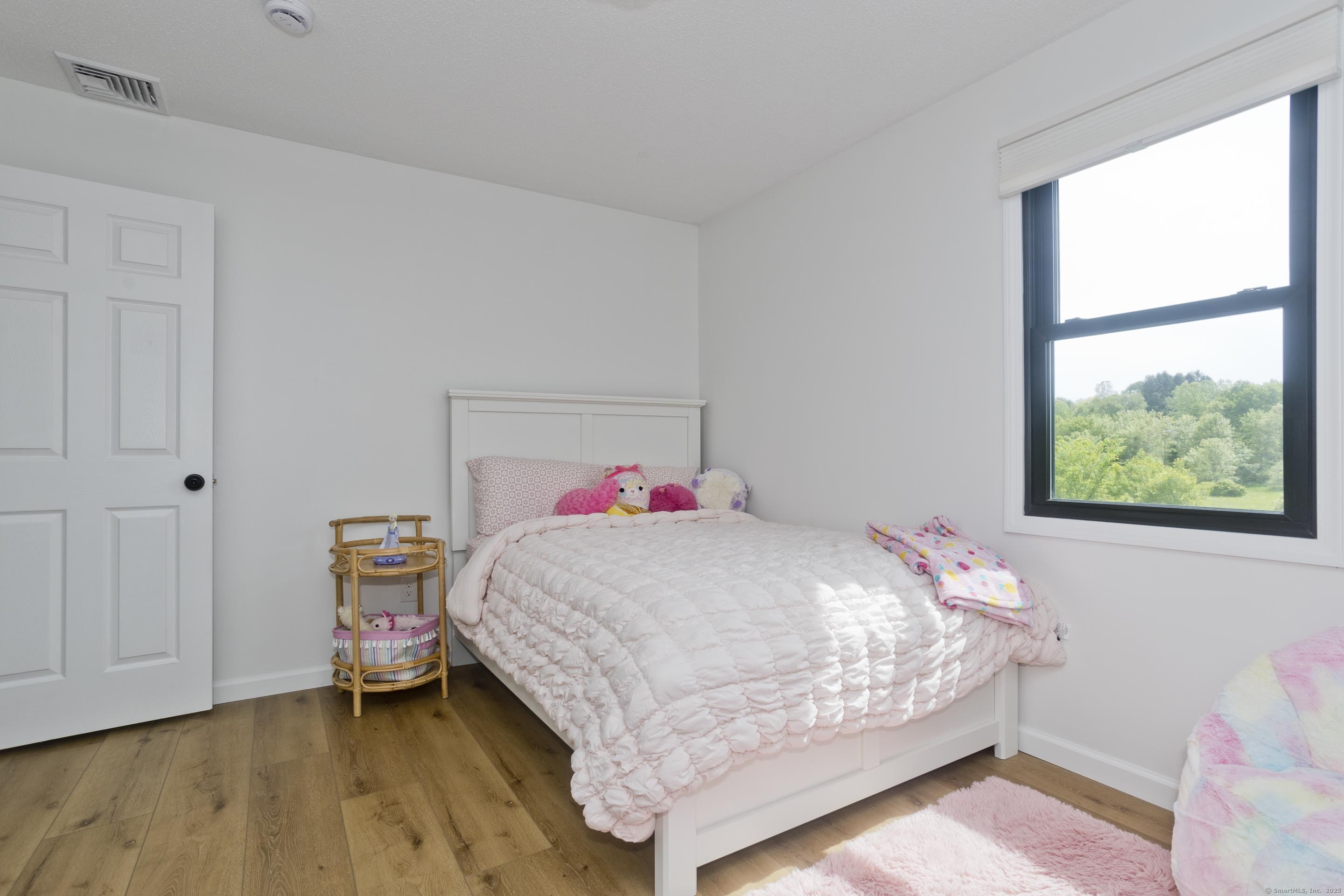 56 Margaret Street Monson, MA 01057 - Photo 28 of 39 a bedroom with a bed and a window