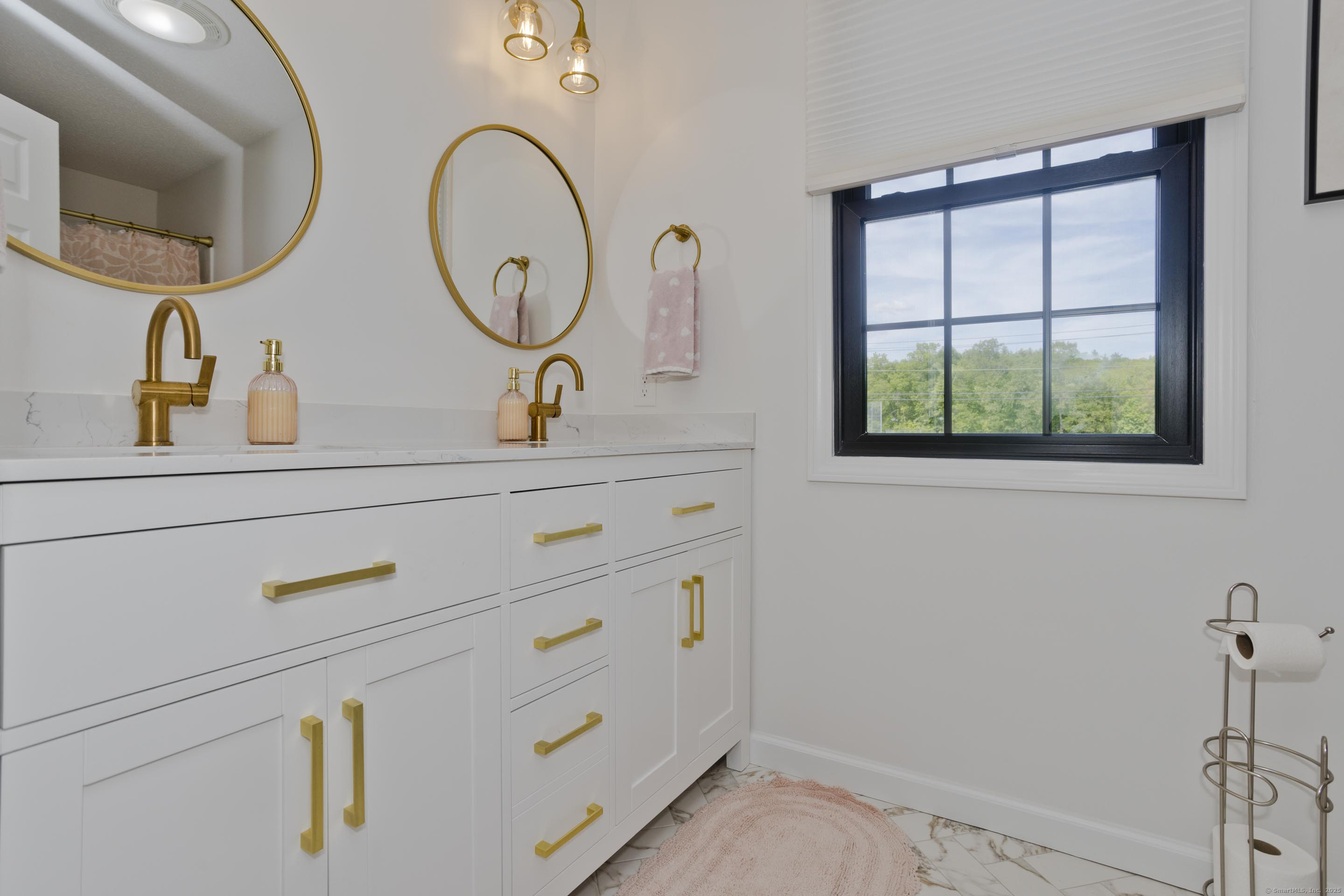 56 Margaret Street Monson, MA 01057 - Photo 31 of 39 a bathroom with a sink and a mirror