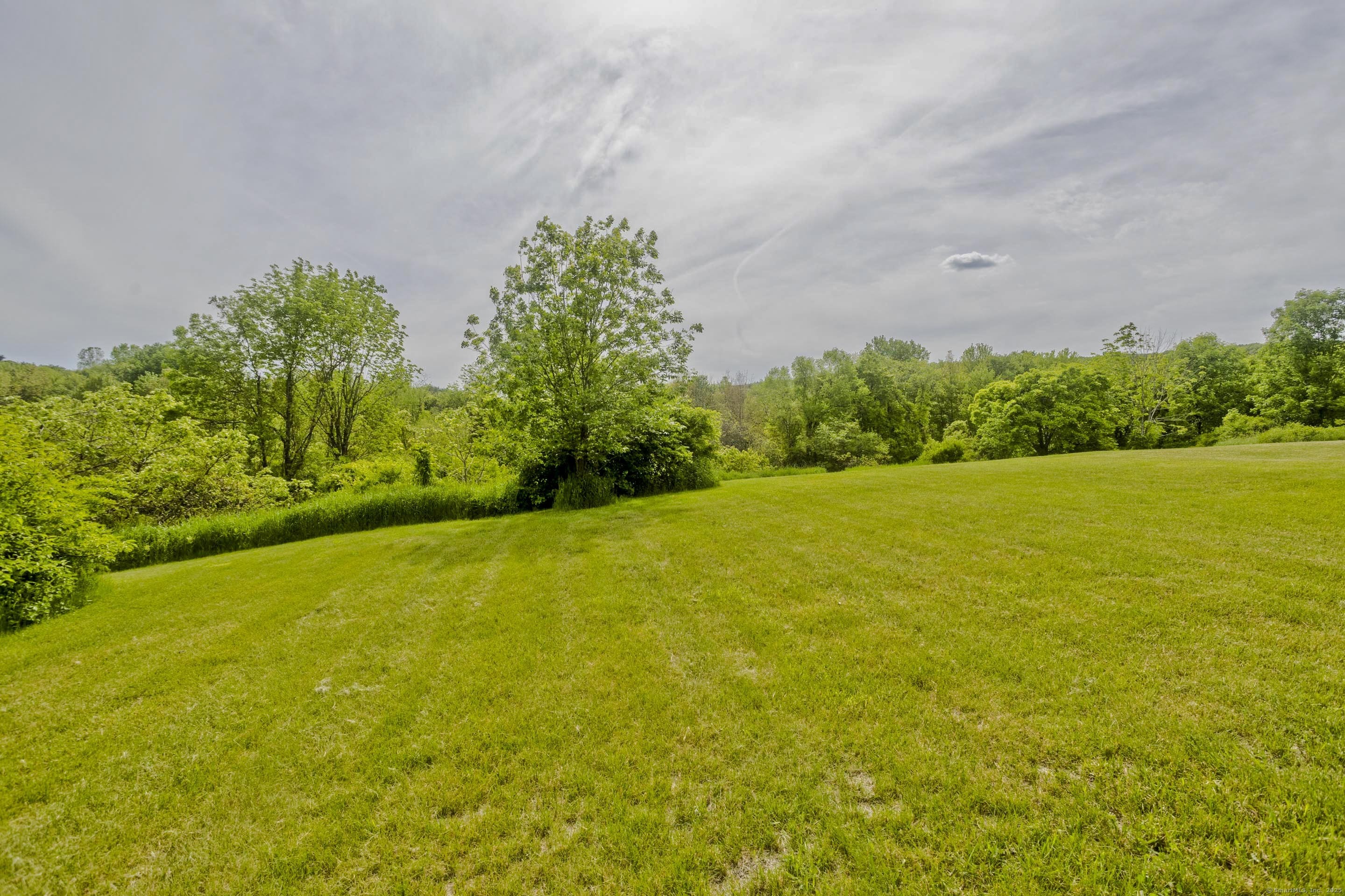 56 Margaret Street Monson, MA 01057 - Photo 35 of 39 a view of a field with an outdoor space