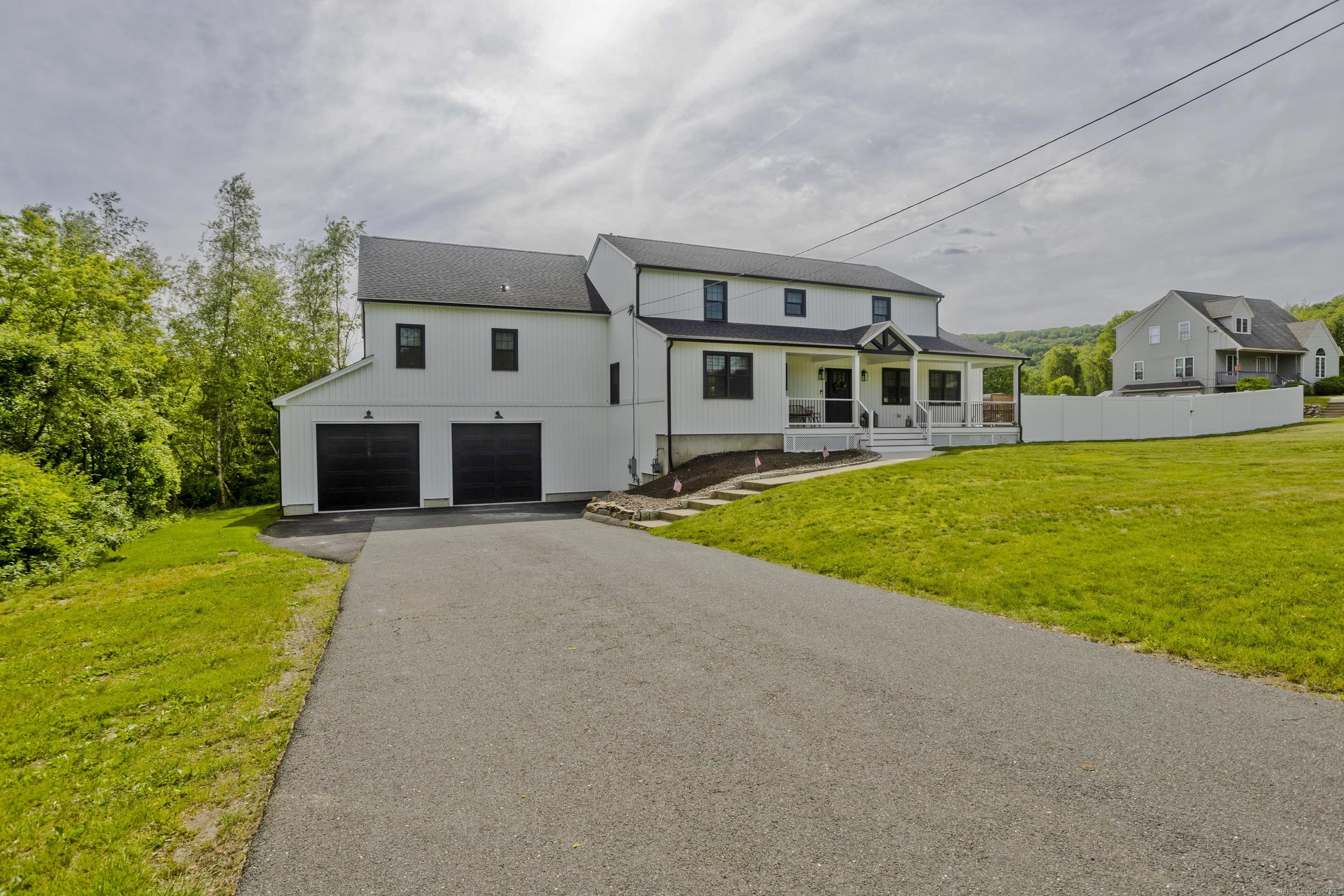 56 Margaret Street Monson, MA 01057 - Photo 39 of 39 a front view of house with yard and green space