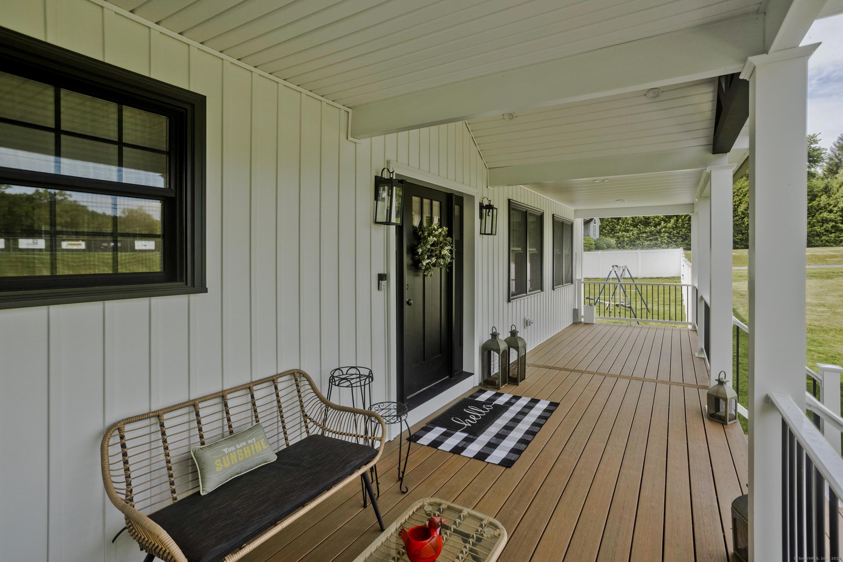 56 Margaret Street Monson, MA 01057 - Photo 4 of 39 a view of a balcony with furniture