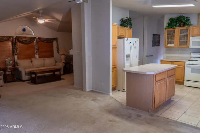 a view of a hallway with washer and dryer