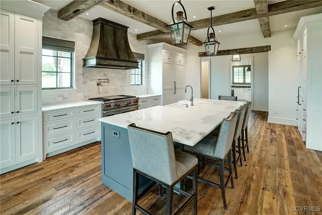 a view of a kitchen with a sink and washer