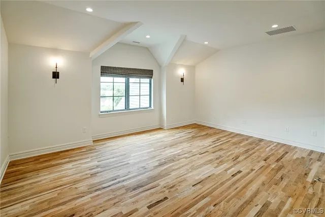 a view of a lake with a city