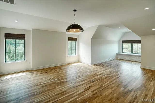 an aerial view of a house with garden space and outdoor seating