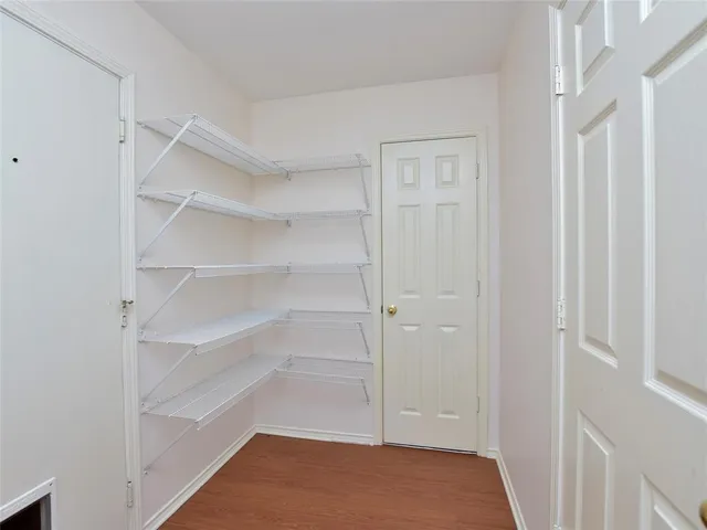 a view of an empty walk in closet