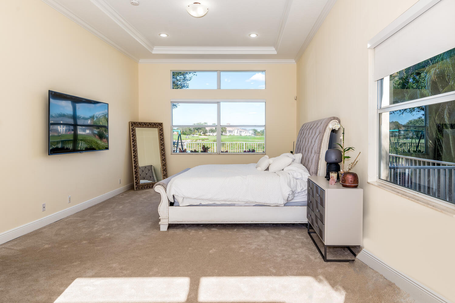 8849 Valhalla Drive Delray Beach, FL 33446 - Photo 18 of 32 a bed room with a bed and a large window