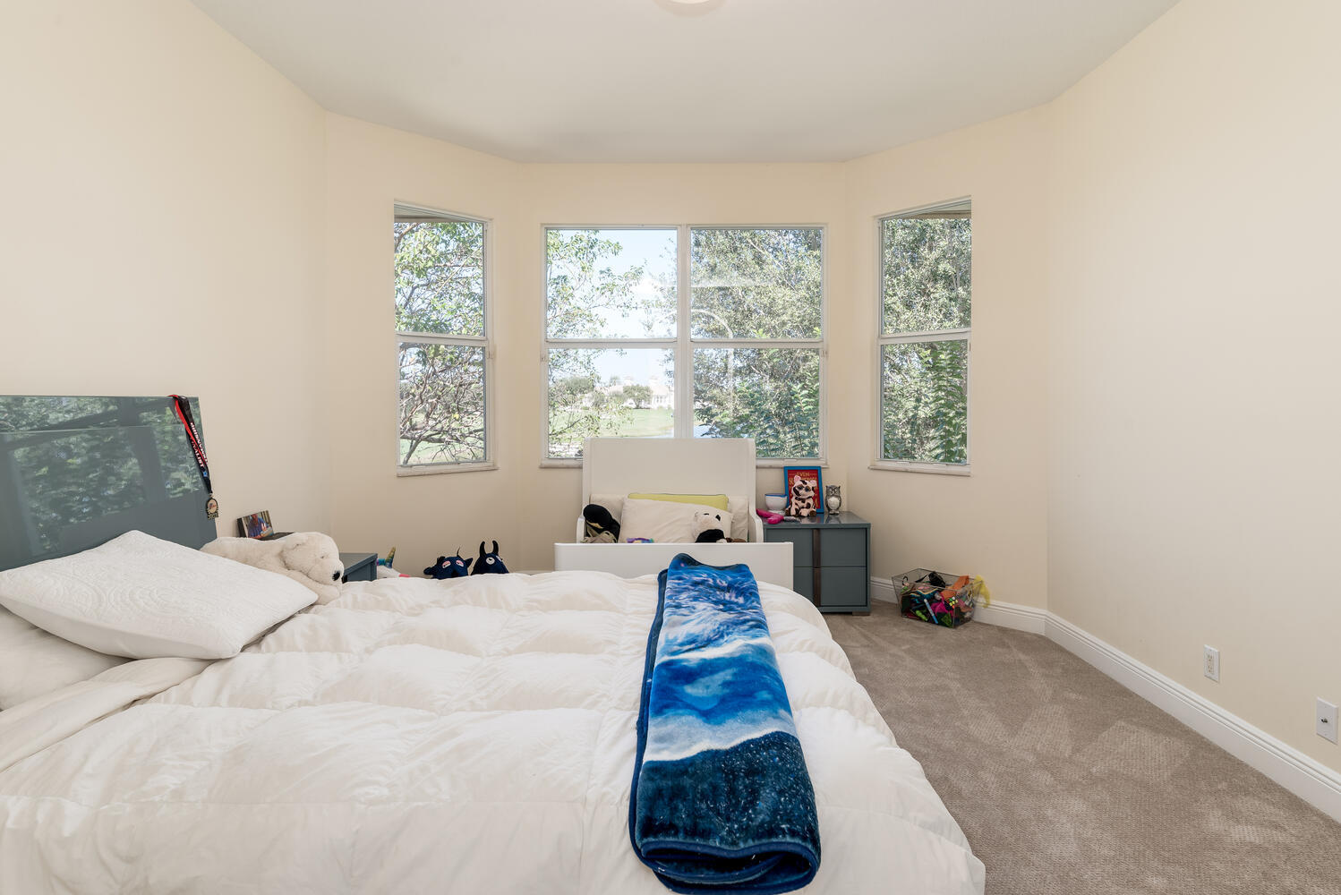 8849 Valhalla Drive Delray Beach, FL 33446 - Photo 19 of 32 a bed room with a bed and a window