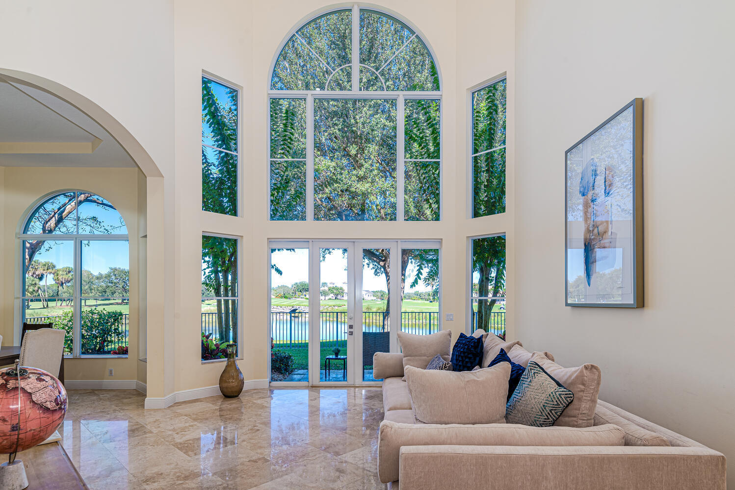 8849 Valhalla Drive Delray Beach, FL 33446 - Photo 2 of 32 a living room with furniture and a large window