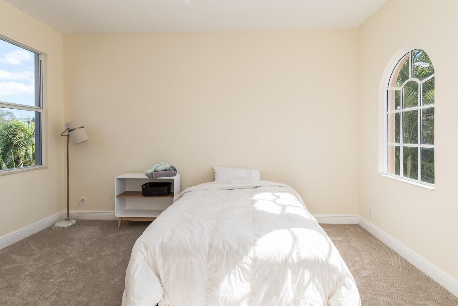 8849 Valhalla Drive Delray Beach, FL 33446 - Photo 21 of 32 a view of a bedroom with bed and window