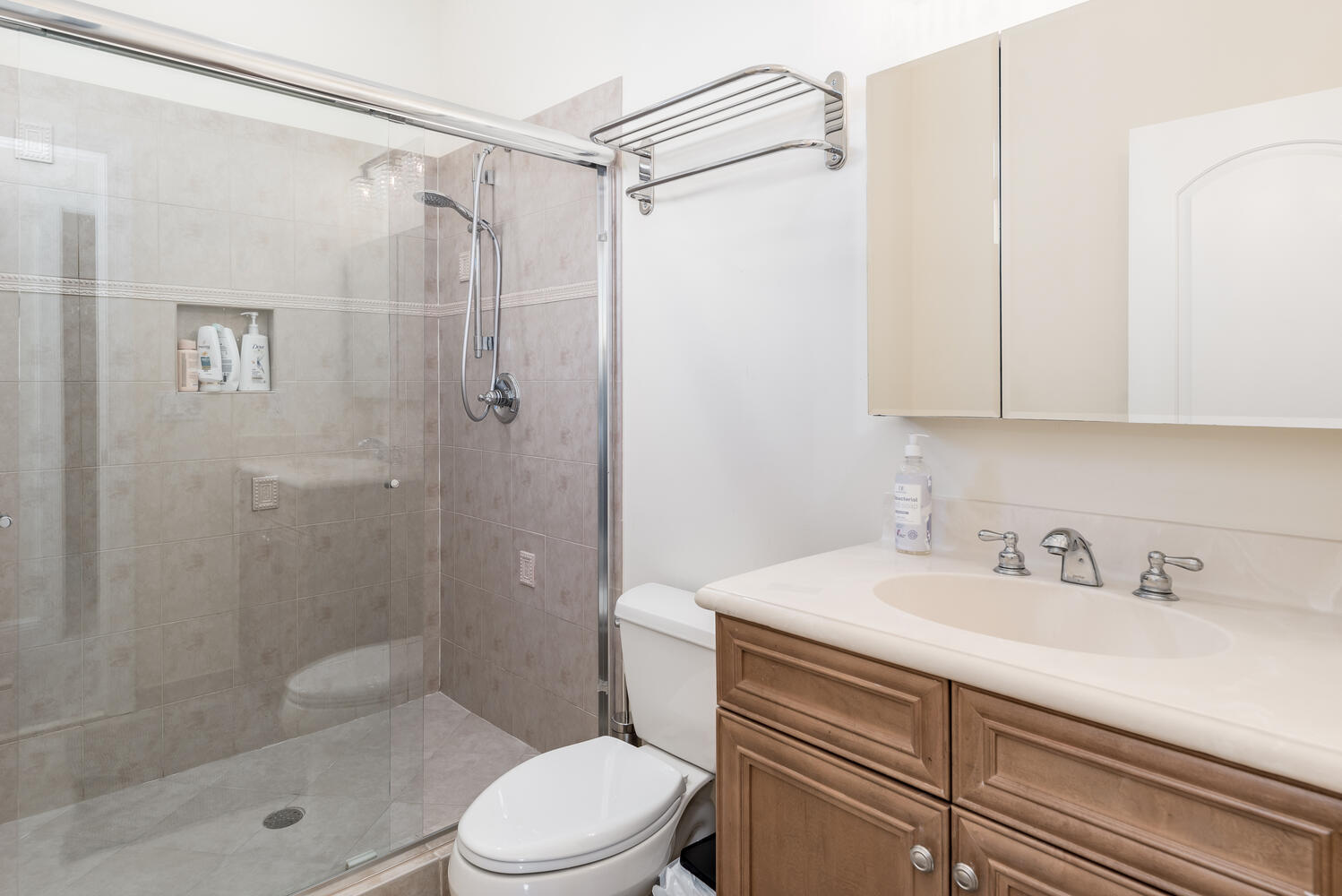 8849 Valhalla Drive Delray Beach, FL 33446 - Photo 22 of 32 a bathroom with a sink a toilet and shower