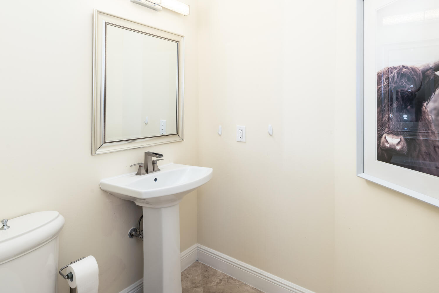 8849 Valhalla Drive Delray Beach, FL 33446 - Photo 25 of 32 a bathroom with a sink a toilet and mirror