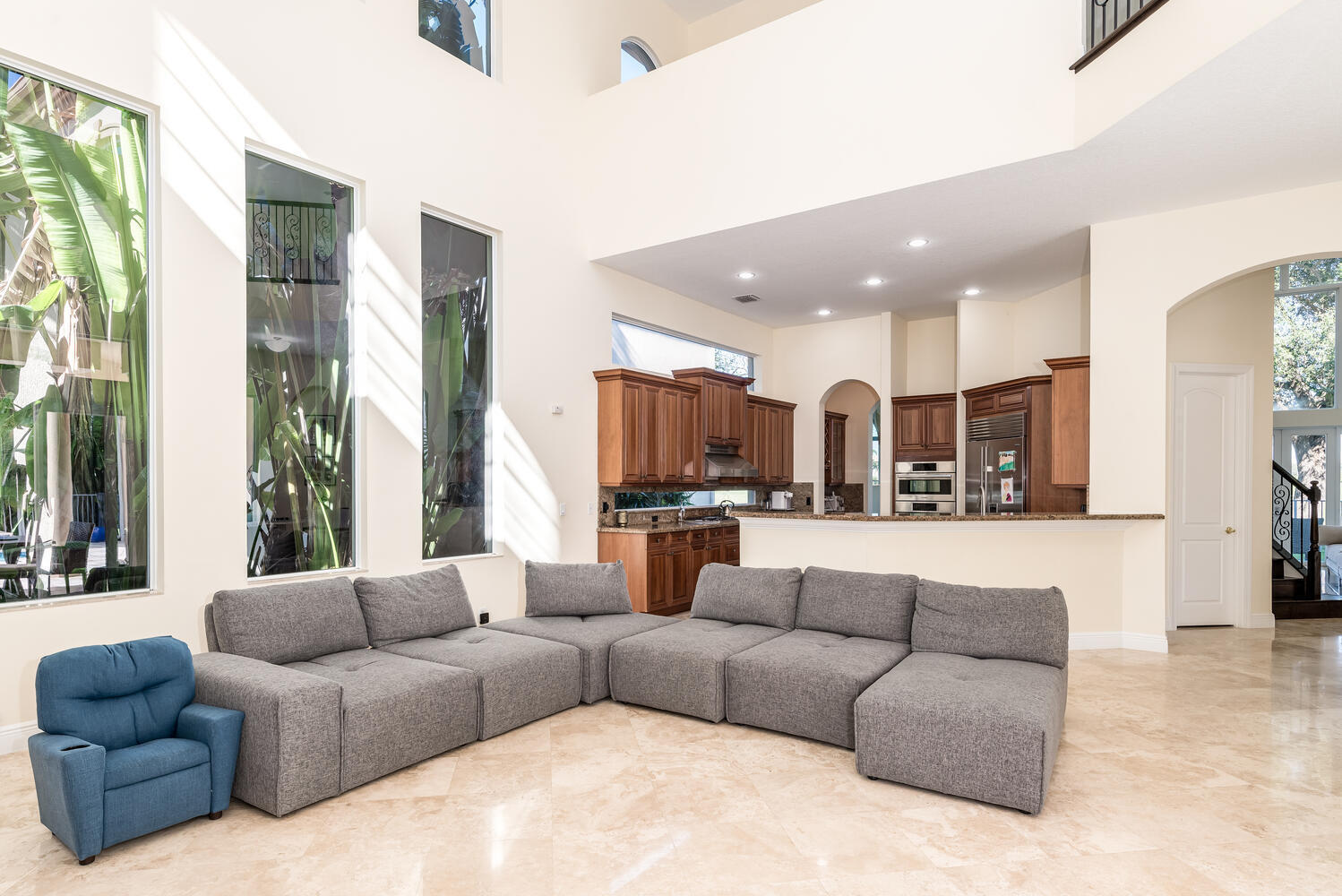 8849 Valhalla Drive Delray Beach, FL 33446 - Photo 26 of 32 a living room with furniture and a large window