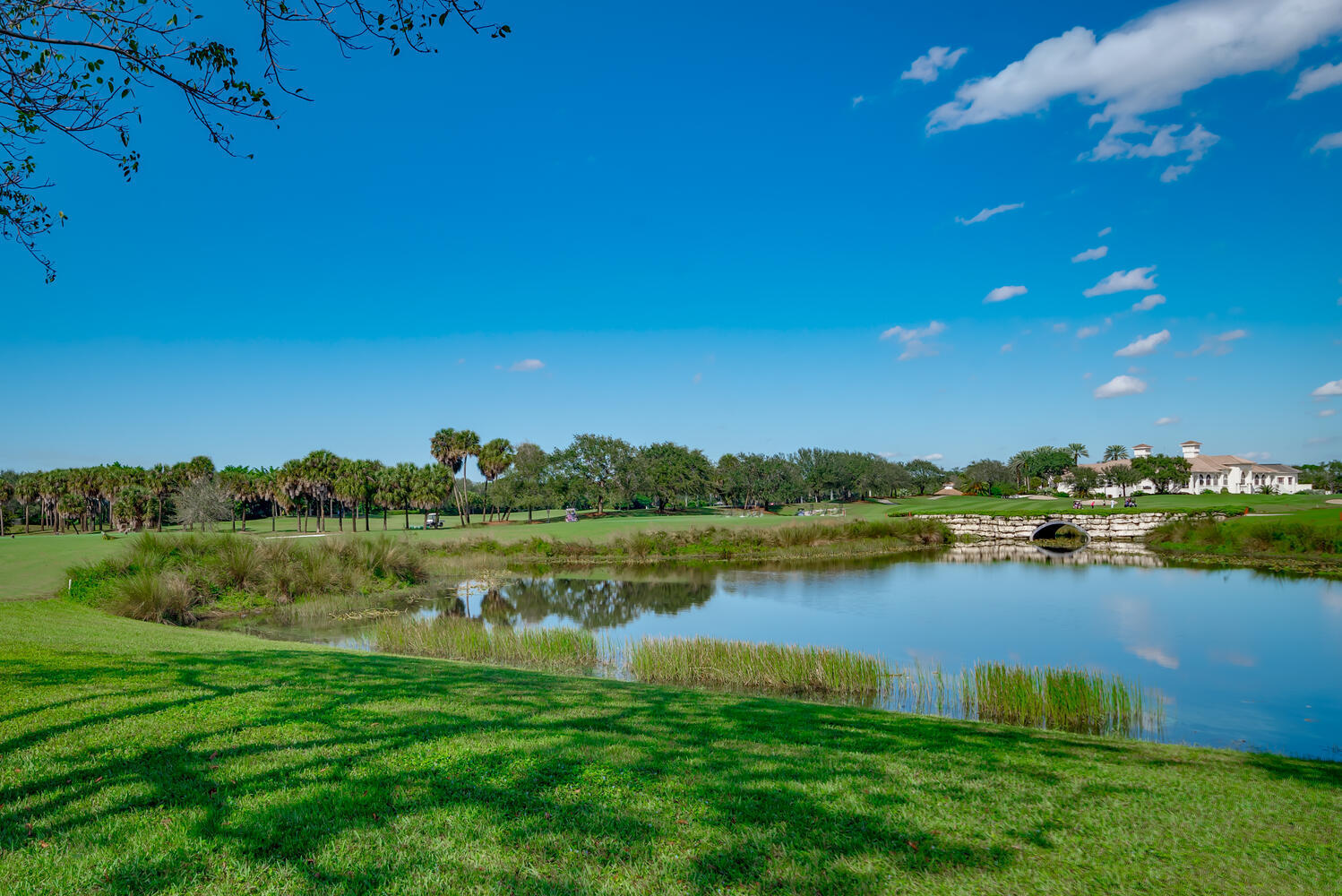 8849 Valhalla Drive Delray Beach, FL 33446 - Photo 3 of 32 a view of a lake with houses in the back