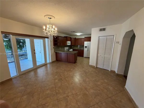 a view of a kitchen with a sink and dishwasher kitchen view