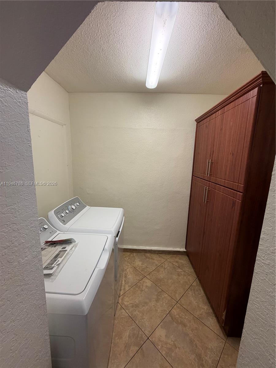 6090 West 5th Lane Hialeah, FL 33012 - Photo 10 of 28 a utility room with dryer and washer