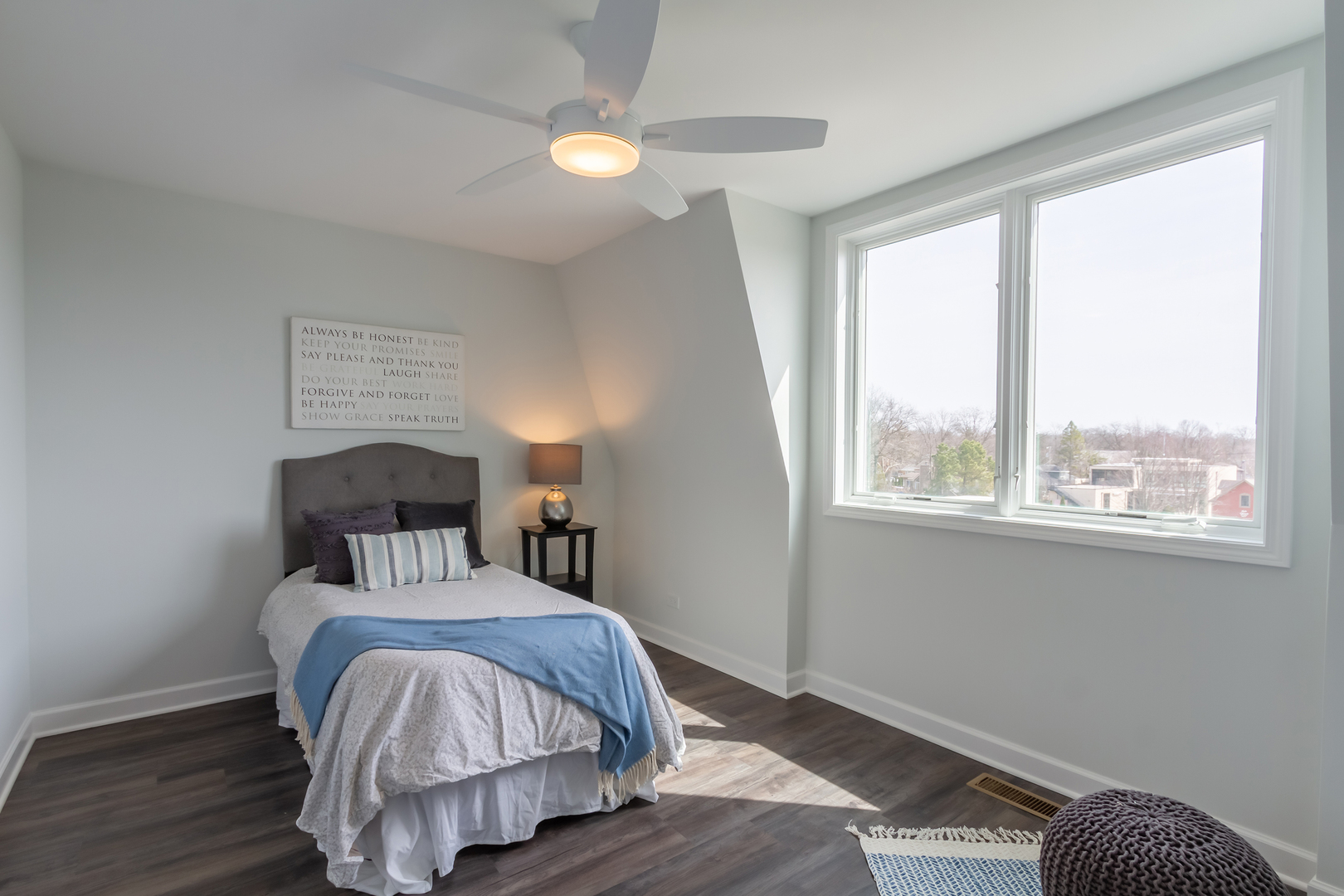 1209 Shermer Road Northbrook, IL 60062 - Photo 17 of 23 a bed sitting in a bedroom next to a window
