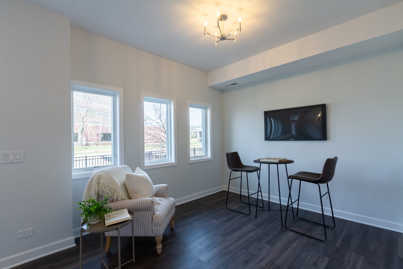 1209 Shermer Road Northbrook, IL 60062 - Photo 20 of 23 a view of a dining room with furniture window and wooden floor