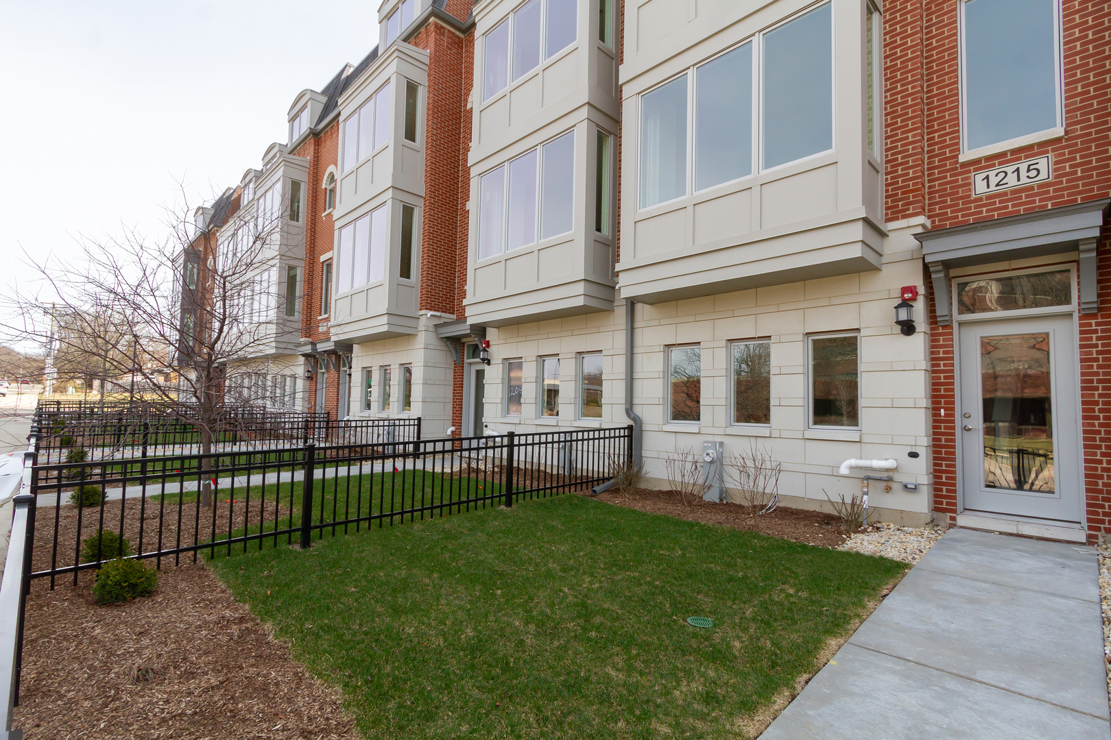 1209 Shermer Road Northbrook, IL 60062 - Photo 2 of 23 a view of an apartment with a backyard