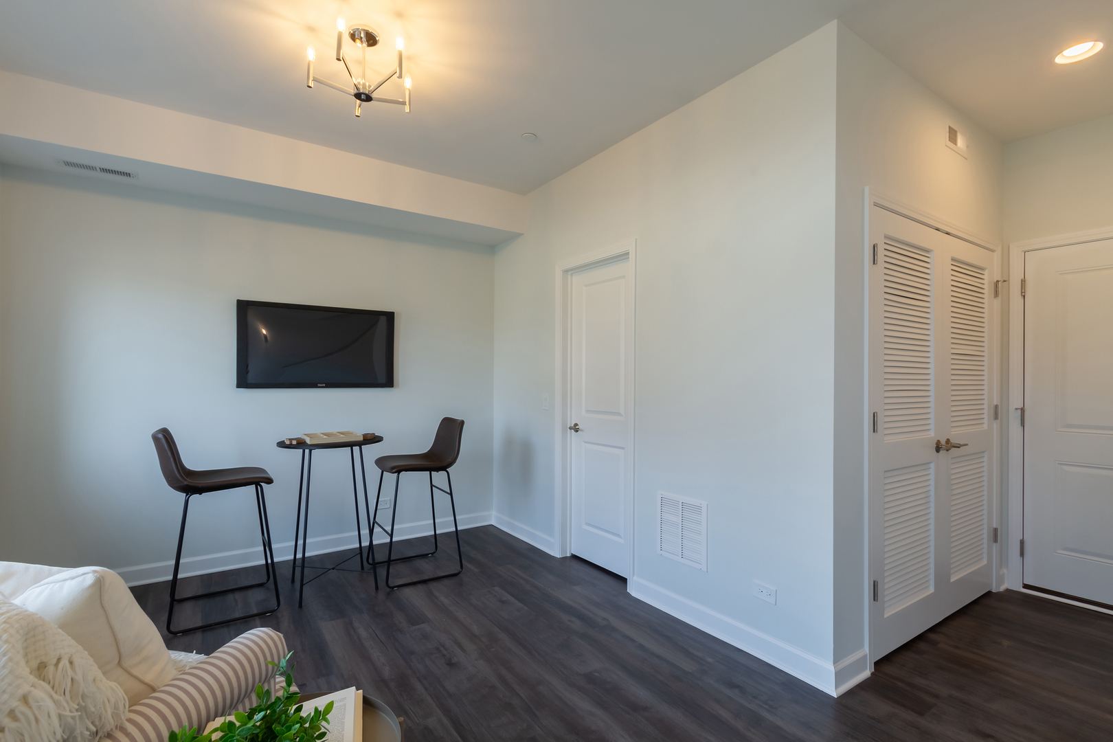 1209 Shermer Road Northbrook, IL 60062 - Photo 21 of 23 a view of a livingroom with furniture and a flat screen tv