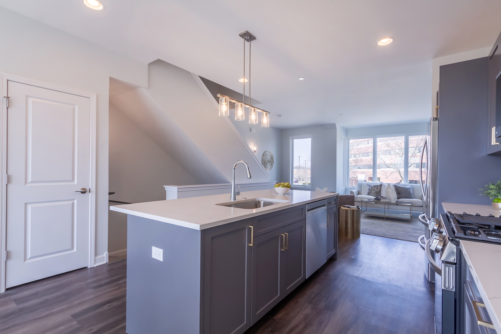 1209 Shermer Road Northbrook, IL 60062 - Photo 7 of 23 a kitchen with lots of counter space a sink appliances and cabinets