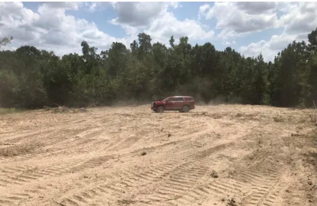 Tbd Aster Road Gilmer, TX 75644 - Photo 5 of 5 a view of side of snow with trees in the background