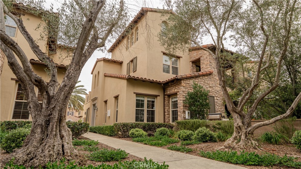 14 San Sovino Newport Coast, CA 92657 - Photo 1 of 44 a view of a white house with a large tree