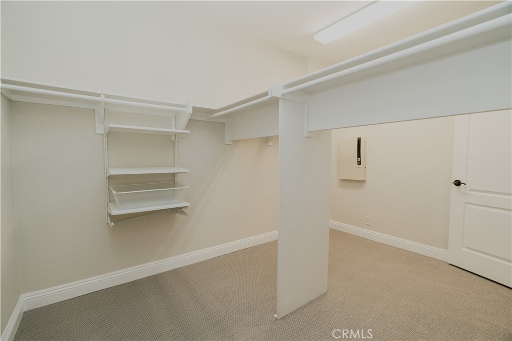 14 San Sovino Newport Coast, CA 92657 - Photo 16 of 44 a view of an empty walk in closet