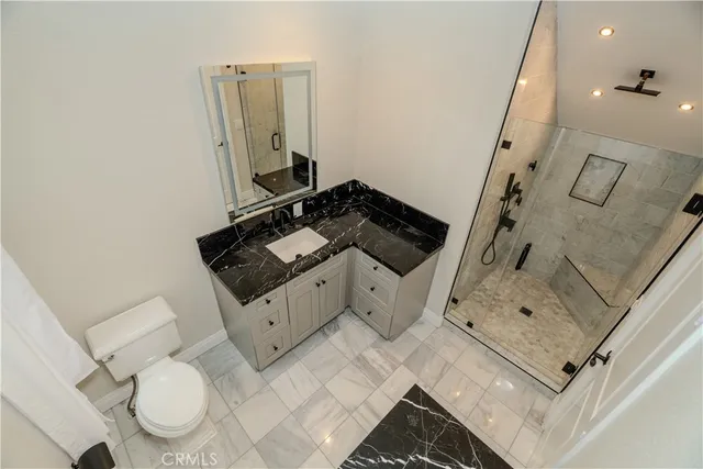 wooden floor with table and chairs