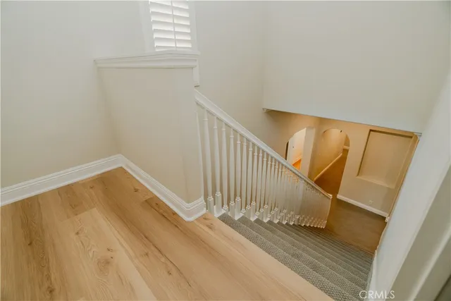 a view of entryway with wooden floor