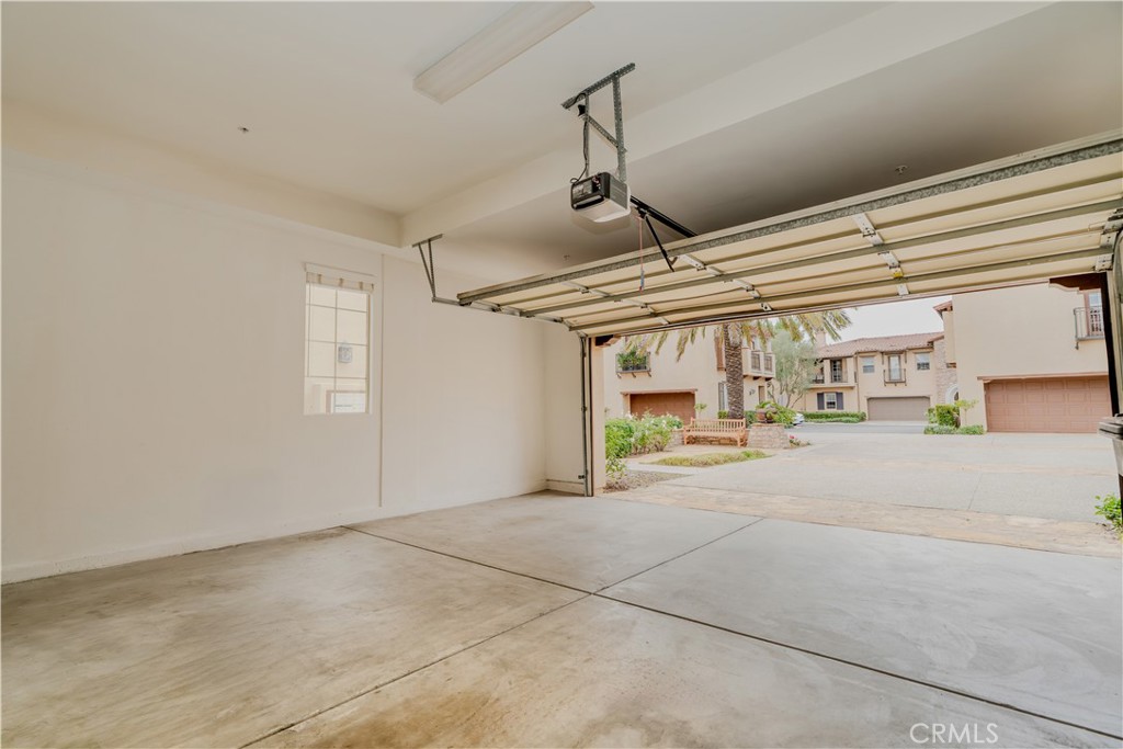 14 San Sovino Newport Coast, CA 92657 - Photo 34 of 44 a big room with chandelier fan and windows