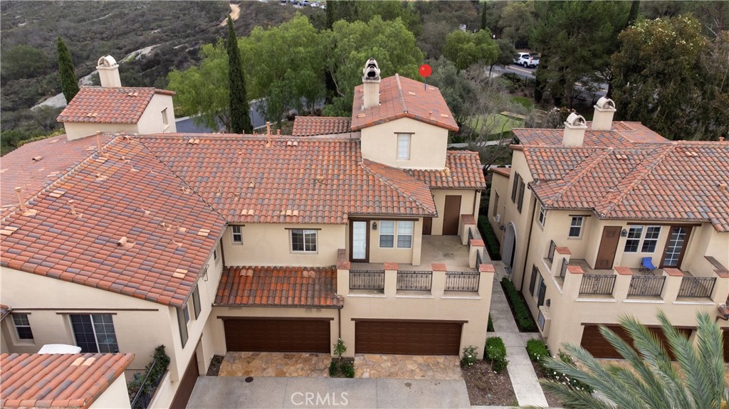 14 San Sovino Newport Coast, CA 92657 - Photo 37 of 44 a front view of a house with a garden